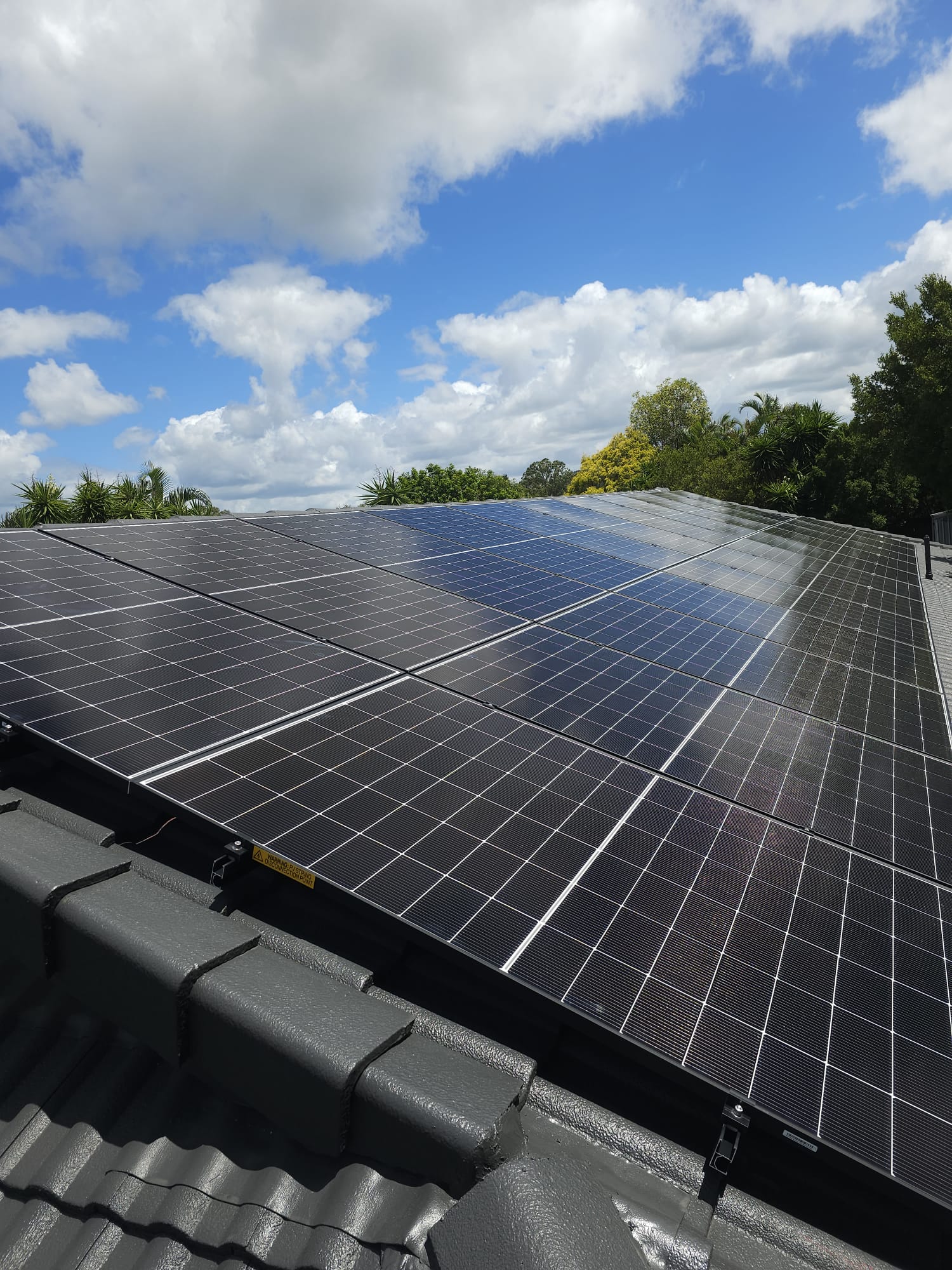 SEG solar panel installation on Queensland tile roof
